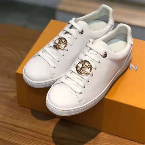 gold Louis Vuitton sneakers